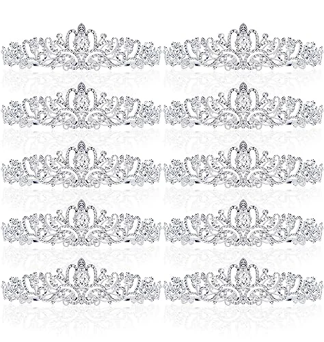 Ten silver crystal tiaras laid out in rows on white